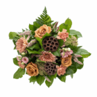 Elegant floral arrangement with pink and peach roses, chrysanthemums, and lush green leaves, perfect for celebrations.
