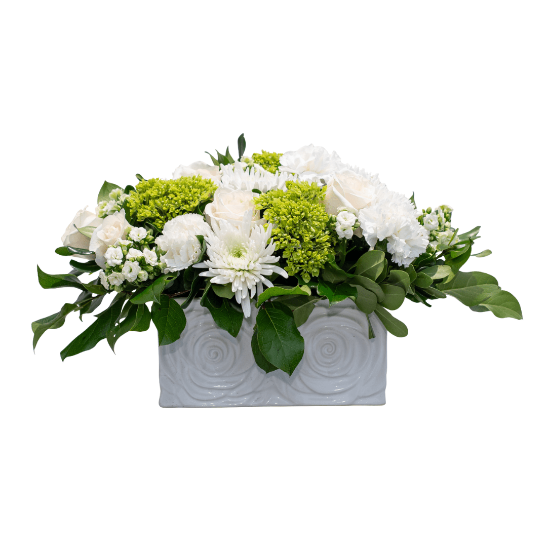 1 White and green floral arrangement in a decorative ceramic vase with lush leaves, perfect for elegant home decor.