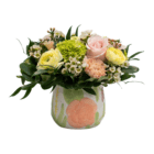 Fresh floral arrangement with pastel roses and greenery in a decorative ceramic vase, ideal for gifts and decor.