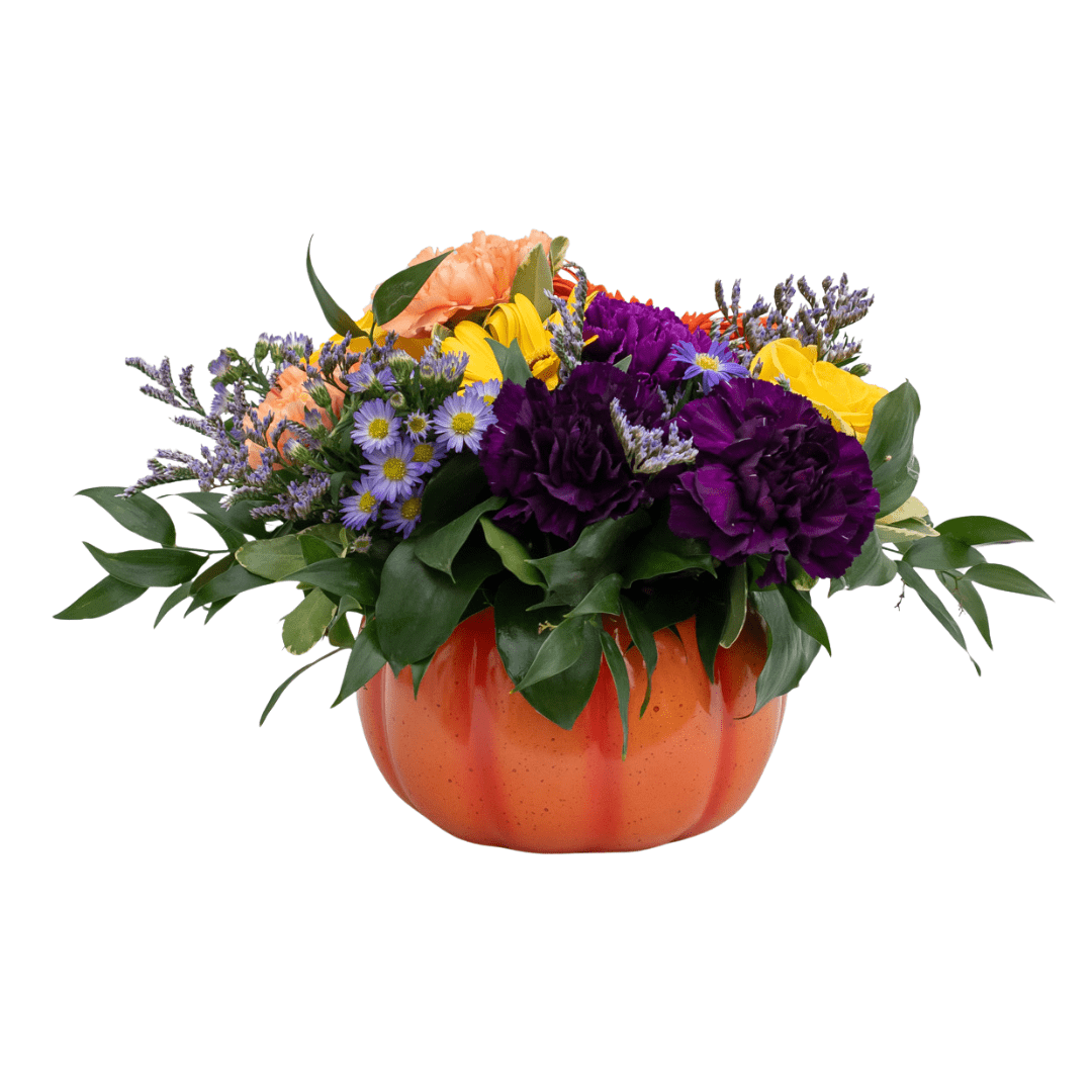 395 A yellow, peach, and purple fresh floral arrangement in an orange ceramic pumpkin-shaped pot.