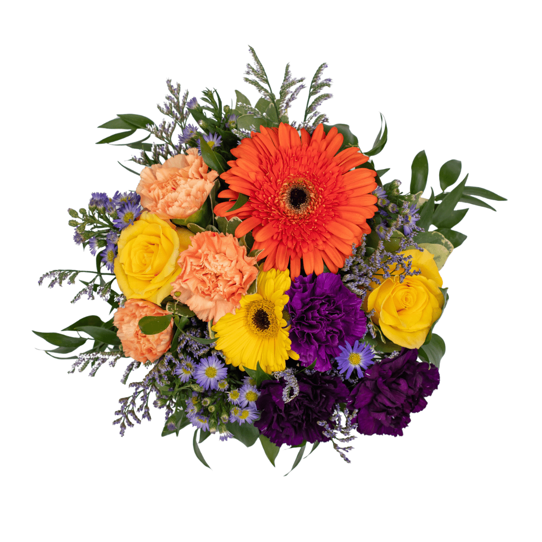 An above view of a yellow, peach, and purple fresh floral arrangement.
