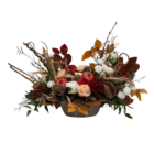 A fall floral centerpiece with rich, earthy tones, including dahlias, mums, hypericum berries, roses, lisianthus, foraged-looking branches, pods, wheat stems, and artificial apples.
