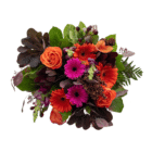 An above view of a floral bouquet with pink and orange gerberas, orange roses, calla lilies, burgundy hypericum berries, and smokebush foliage.